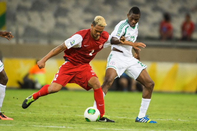 Alvin Tehau (Tahiti) Kenneth Omeruo (Nigeria).jpg